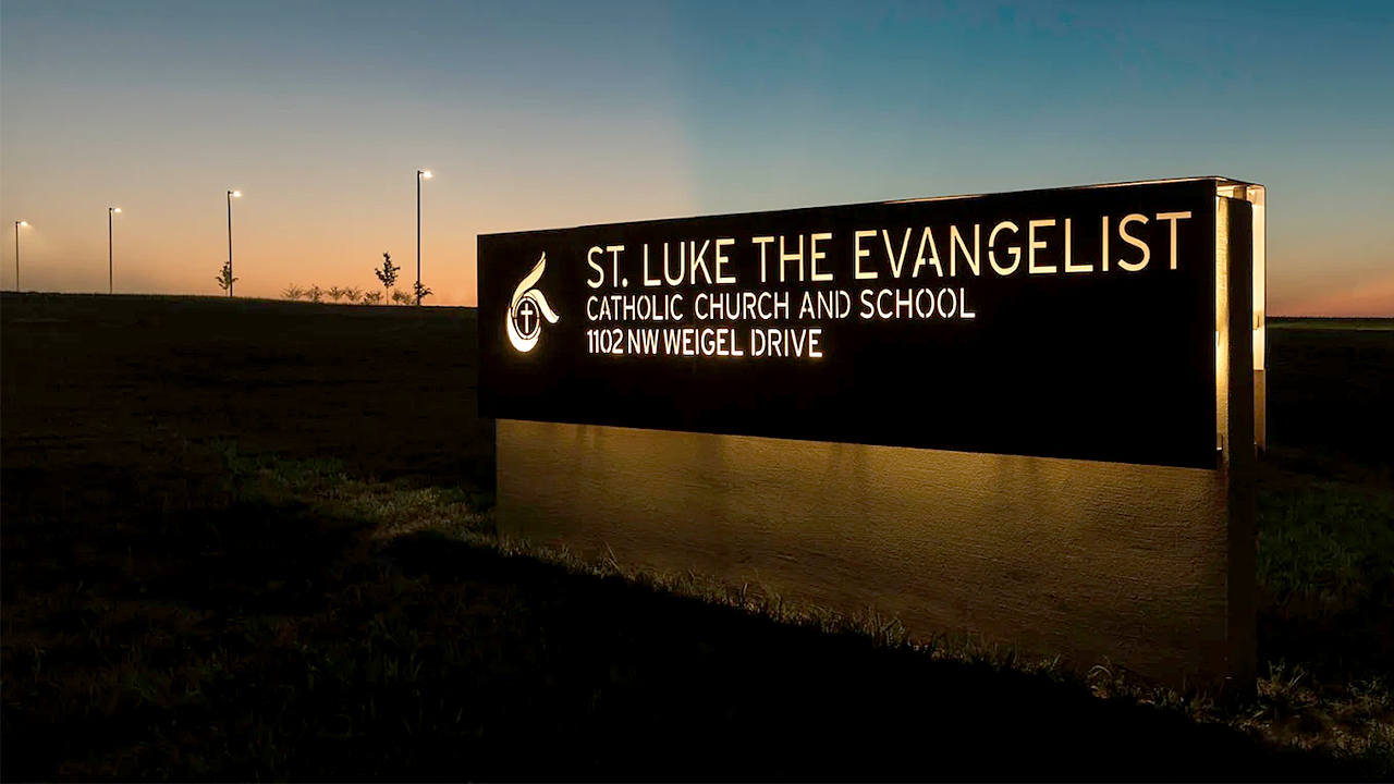 st luke school sign car hits students